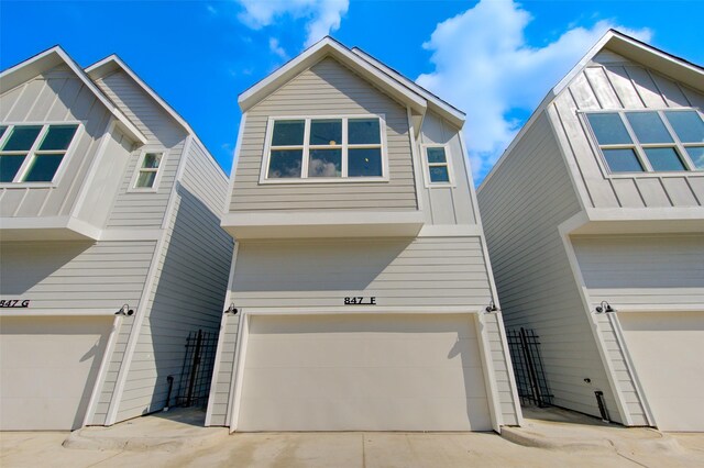 847 Rachel St Unit H, Houston, TX 77091 - view of home's exterior with a garage and concrete driveway