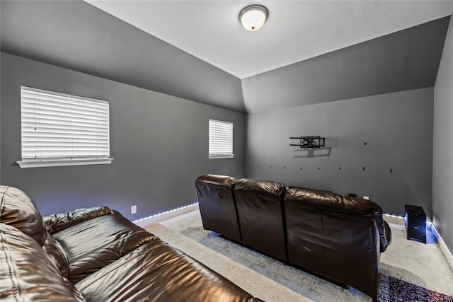 6 Volerran Path Ln, Missouri City, TX 77459 - cinema room with light colored carpet, baseboards, and vaulted ceiling