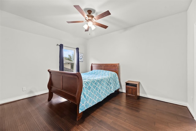 6 Volerran Path Ln, Missouri City, TX 77459 - bedroom featuring baseboards, dark wood-style floors, and a ceiling fan