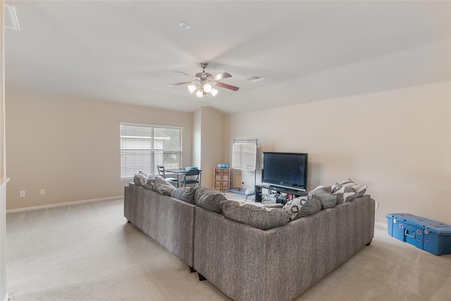 3610 Harewood Ct, Pearland, TX 77584 - living area featuring light carpet, ceiling fan, and baseboards