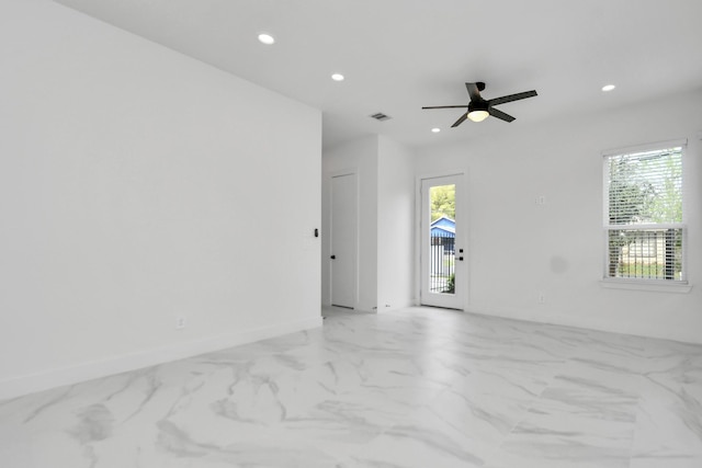 849 Mansfield St Unit F, Houston, TX 77091 - unfurnished room featuring recessed lighting, light marble finish floors, and ceiling fan