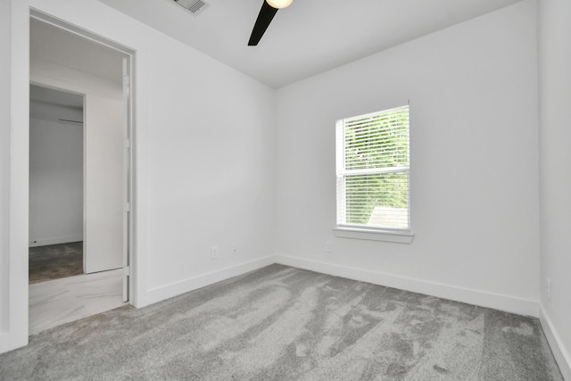 849 Mansfield St Unit F, Houston, TX 77091 - spare room featuring a ceiling fan and carpet floors