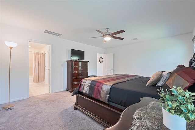 766 Hardwood Grove Ct, Houston, TX 77090 - bedroom featuring light carpet, baseboards, a ceiling fan, and ensuite bathroom