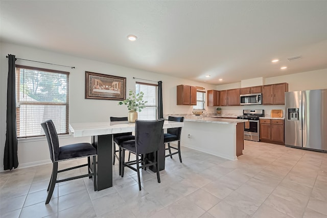 766 Hardwood Grove Ct, Houston, TX 77090 - dining space with recessed lighting and baseboards