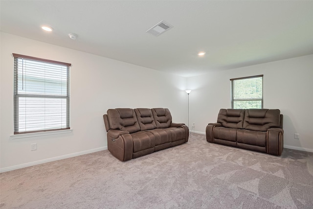 766 Hardwood Grove Ct, Houston, TX 77090 - living area featuring baseboards, carpet, and recessed lighting