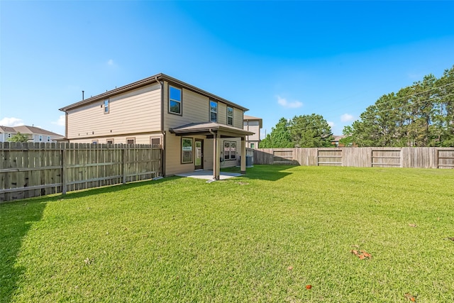 766 Hardwood Grove Ct, Houston, TX 77090 - rear view of house featuring a patio