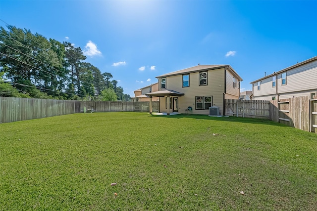 766 Hardwood Grove Ct, Houston, TX 77090 - rear view of property featuring central AC unit and a patio area