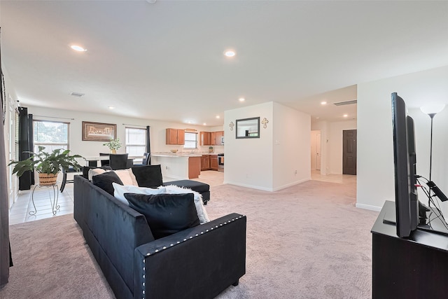 766 Hardwood Grove Ct, Houston, TX 77090 - living area featuring recessed lighting, light colored carpet, and baseboards