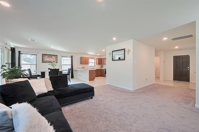 766 Hardwood Grove Ct, Houston, TX 77090 - living area featuring baseboards, recessed lighting, and light carpet