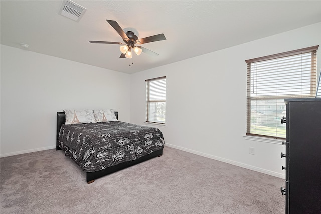 766 Hardwood Grove Ct, Houston, TX 77090 - carpeted bedroom featuring baseboards and a ceiling fan