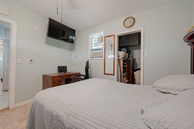 2087 Rd 5210, Cleveland, TX 77327 - bedroom featuring cooling unit, a closet, and light tile patterned flooring