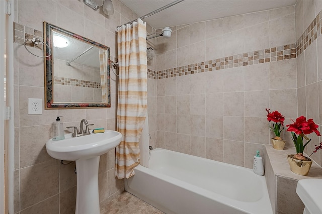 2087 Rd 5210, Cleveland, TX 77327 - bathroom with tile walls and shower / bath combo
