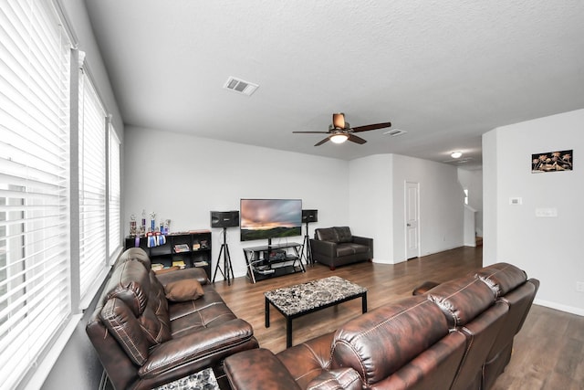 18510 Snowy River Ln, Katy, TX 77084 - living room with wood finished floors, a ceiling fan, and baseboards
