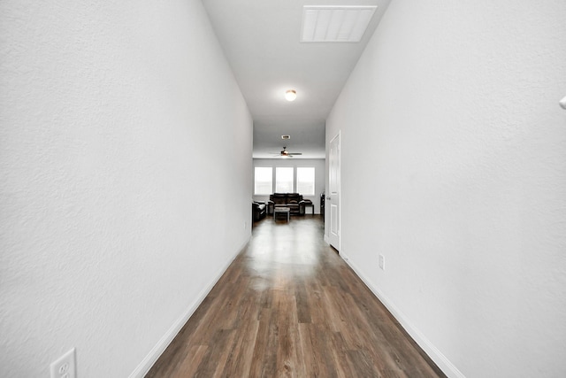 18510 Snowy River Ln, Katy, TX 77084 - hallway with dark wood finished floors and baseboards