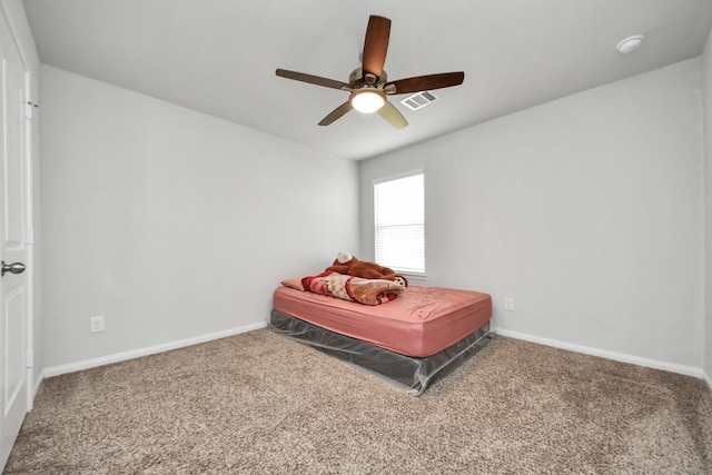 18510 Snowy River Ln, Katy, TX 77084 - bedroom with carpet floors, baseboards, and ceiling fan