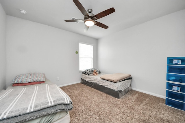 18510 Snowy River Ln, Katy, TX 77084 - bedroom with carpet floors, baseboards, and ceiling fan