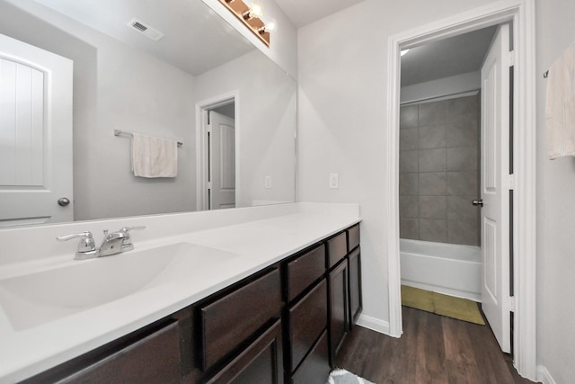 18510 Snowy River Ln, Katy, TX 77084 - bathroom featuring vanity, wood finished floors, and baseboards