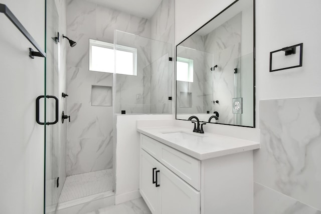 853 Mansfield St Unit D, Houston, TX 77091 - bathroom with marble finish floors, a marble finish shower, and vanity