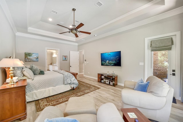 22414 Meadowhurst Cir W, Tomball, TX 77377 - bedroom with a raised ceiling, light wood-type flooring, ornamental molding, recessed lighting, and baseboards