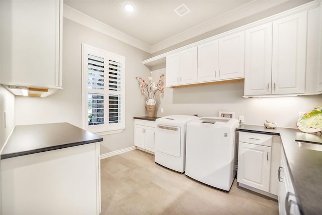 22414 Meadowhurst Cir W, Tomball, TX 77377 - laundry room featuring cabinet space, separate washer and dryer, ornamental molding, and baseboards