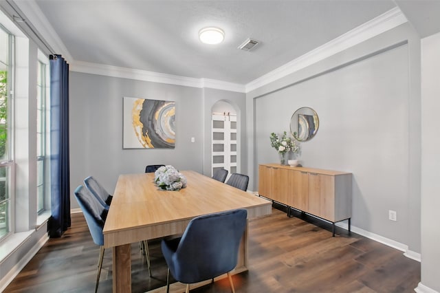 9103 Huckinston Ct, Spring, TX 77379 - dining space featuring healthy amount of natural light, dark wood finished floors, ornamental molding, and baseboards