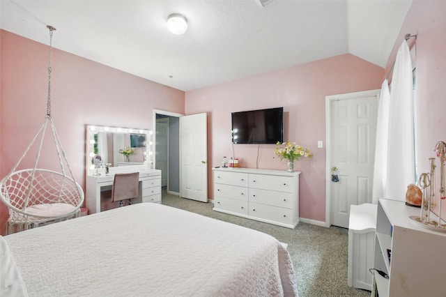 9103 Huckinston Ct, Spring, TX 77379 - bedroom with light colored carpet, vaulted ceiling, and baseboards