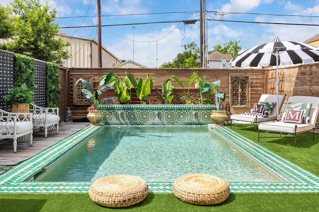 619 W 26th St, Houston, TX 77008 - view of pool with a deck and a fenced backyard