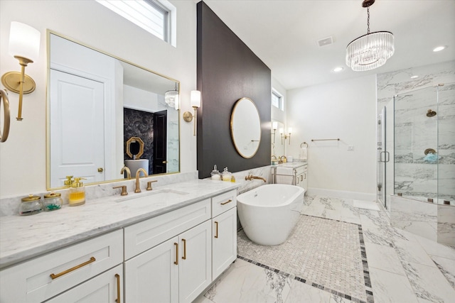 619 W 26th St, Houston, TX 77008 - full bathroom featuring marble tiled flooring, a marble finish shower, two vanities, a freestanding bath, and recessed lighting