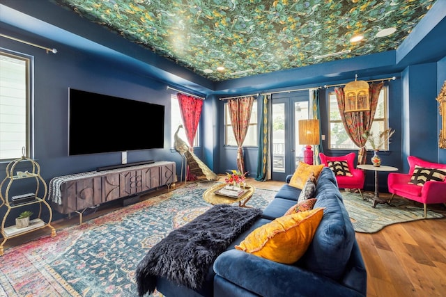 619 W 26th St, Houston, TX 77008 - home theater with wood finished floors, french doors, and a raised ceiling