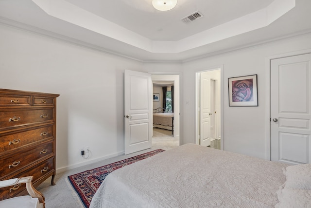 13614 Champions Centre Dr, Houston, TX 77069 - bedroom featuring a raised ceiling, light carpet, and baseboards