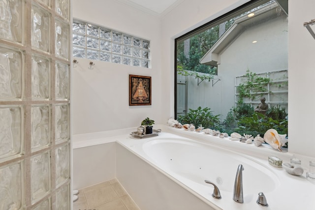 13614 Champions Centre Dr, Houston, TX 77069 - bathroom featuring a whirlpool tub, tile patterned floors, and crown molding