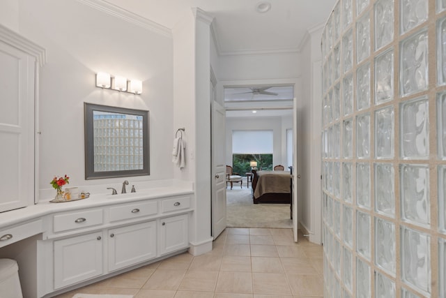 13614 Champions Centre Dr, Houston, TX 77069 - bathroom with ensuite bathroom, vanity, tile patterned floors, crown molding, and ceiling fan