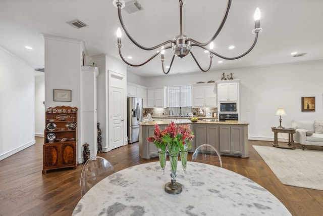 13614 Champions Centre Dr, Houston, TX 77069 - dining room featuring a chandelier, baseboards, recessed lighting, and dark wood-style floors