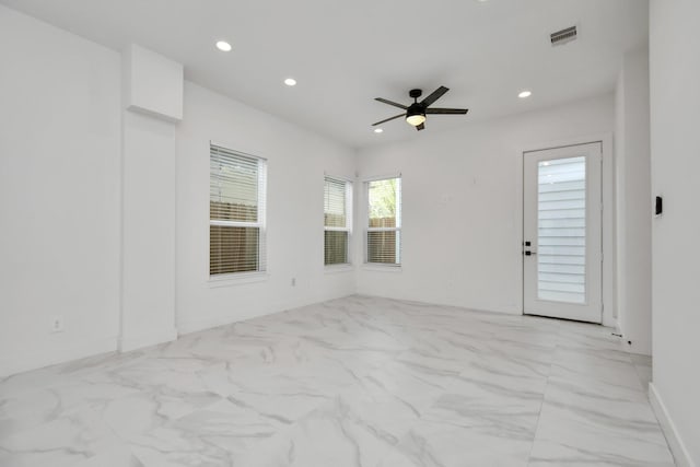 853 Mansfield St Unit B, Houston, TX 77091 - spare room featuring light marble finish floors, recessed lighting, and ceiling fan