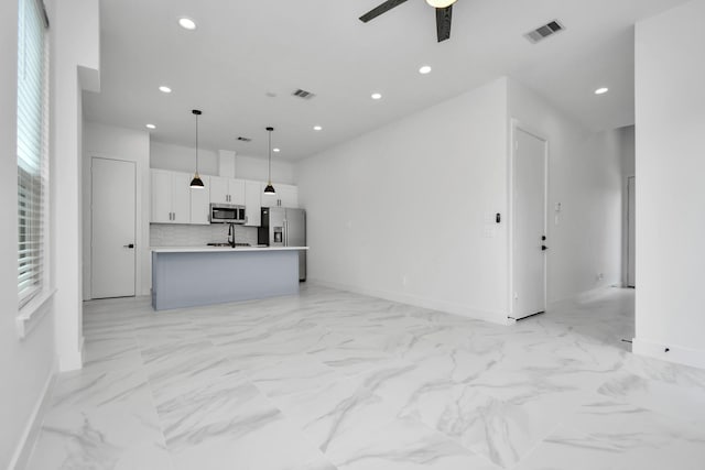 849 Mansfield St Unit B, Houston, TX 77091 - unfurnished living room featuring recessed lighting, a ceiling fan, and light marble finish floors
