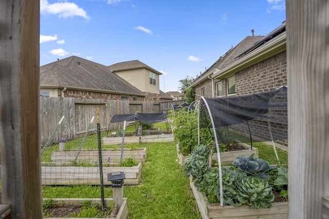 9210 Monarch Field Ln, Cypress, TX 77433 - view of yard featuring a garden