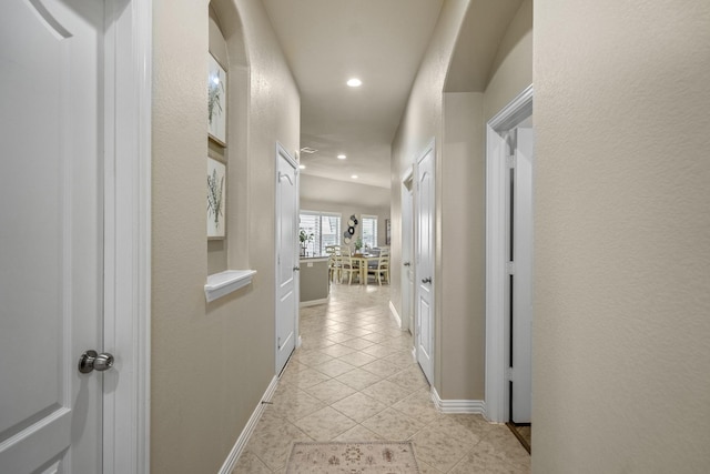 9210 Monarch Field Ln, Cypress, TX 77433 - corridor featuring light tile patterned floors and recessed lighting