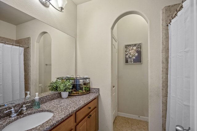 9210 Monarch Field Ln, Cypress, TX 77433 - bathroom featuring vanity, tile patterned flooring, and curtained shower