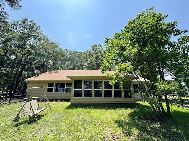 86 Huntington, Trinity, TX 75862 - rear view of house with roof with shingles