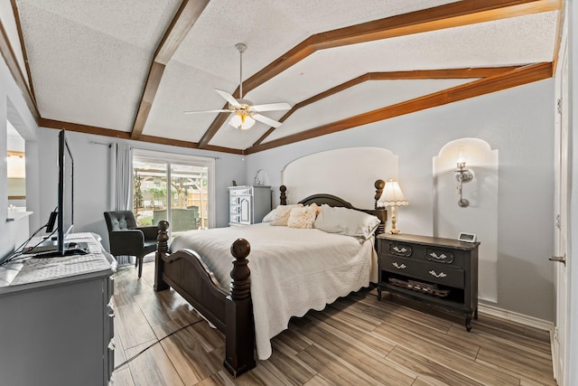 202 Tree Trunk Dr, Spring, TX 77388 - bedroom with a textured ceiling, light wood-type flooring, baseboards, and ceiling fan