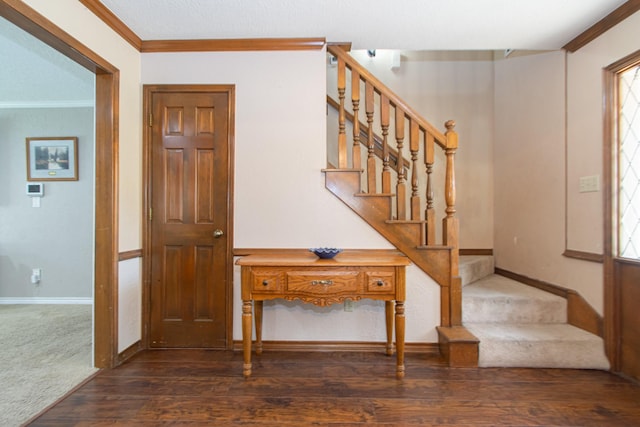 12210 Rocky Lake Ct, Houston, TX 77070 - foyer entrance with ornamental molding, wood finished floors, stairs, and baseboards