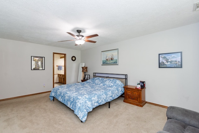 12210 Rocky Lake Ct, Houston, TX 77070 - bedroom featuring light carpet, baseboards, and ceiling fan