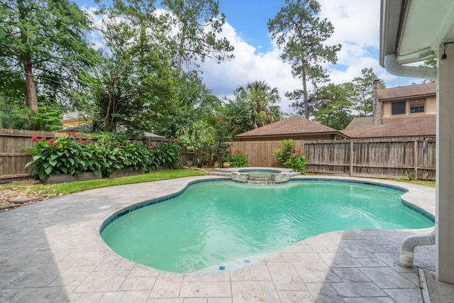 12210 Rocky Lake Ct, Houston, TX 77070 - view of swimming pool featuring a pool with connected hot tub, a fenced backyard, and a patio area