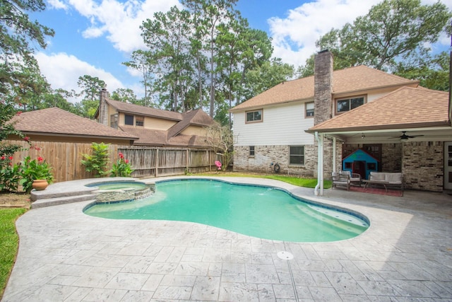 12210 Rocky Lake Ct, Houston, TX 77070 - view of swimming pool featuring a ceiling fan, a patio, a fenced backyard, a pool with connected hot tub, and outdoor lounge area