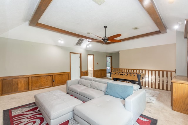 12210 Rocky Lake Ct, Houston, TX 77070 - living area featuring carpet flooring, ceiling fan, and wainscoting