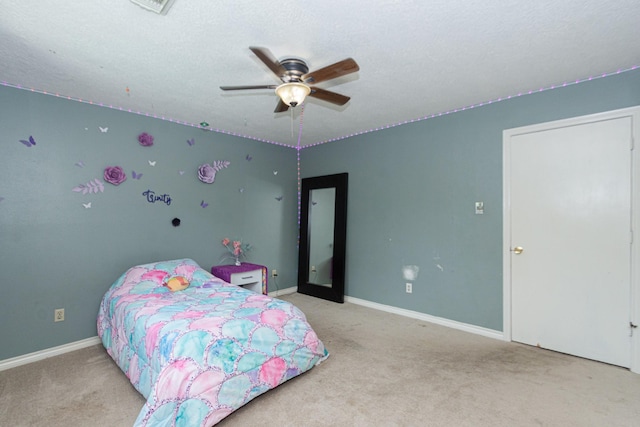 12210 Rocky Lake Ct, Houston, TX 77070 - bedroom with carpet, baseboards, and a ceiling fan