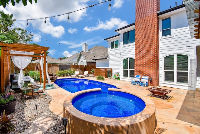 9611 Haven Crossing Ct, Houston, TX 77065 - view of pool featuring an in-ground hot tub, a fenced backyard, a patio, and a fire pit
