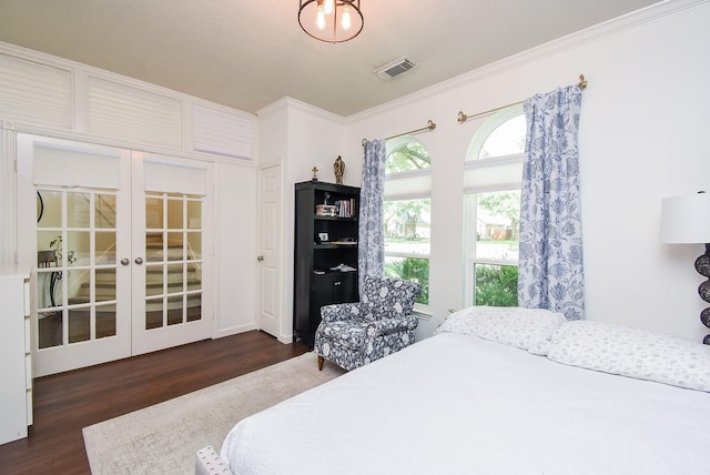 9611 Haven Crossing Ct, Houston, TX 77065 - bedroom featuring wood finished floors, crown molding, and french doors