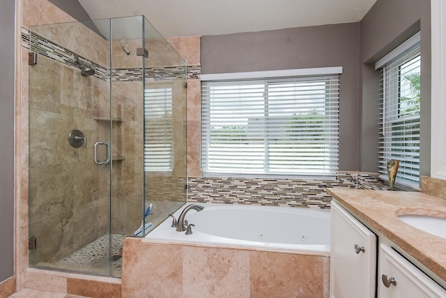 9611 Haven Crossing Ct, Houston, TX 77065 - bathroom with a jetted tub, a shower stall, and vanity