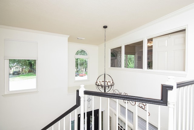 9611 Haven Crossing Ct, Houston, TX 77065 - corridor with a chandelier and crown molding